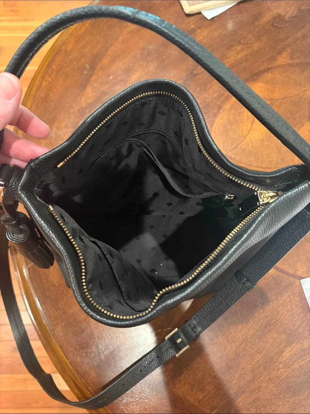 kate spade black pebbled leather shoulder hobo with tassel